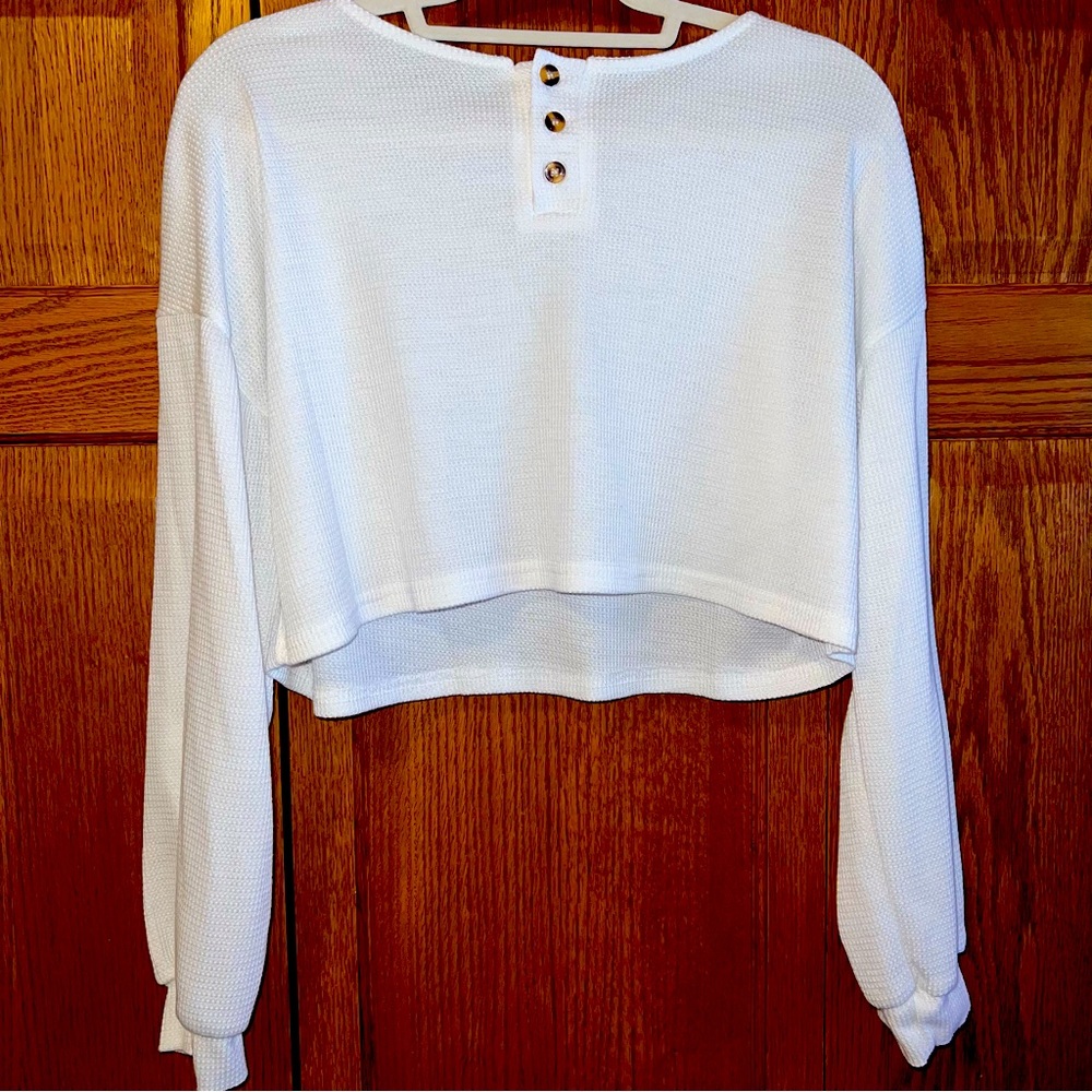 White long sleeve crop top.